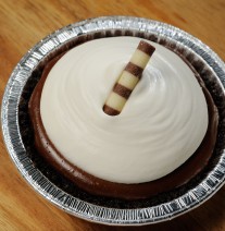 Chocolate Cream Pie Chocolate cookie crust, chocolate pastry cream and whipped cream